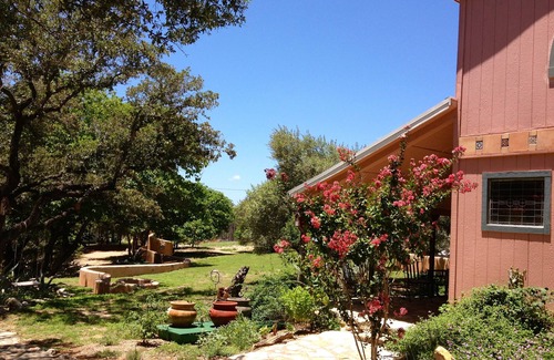 Mouth Of Pedernales Cottage | Enchanting Lakefront Cottage with Kayaks, Hot Tub & Yoga