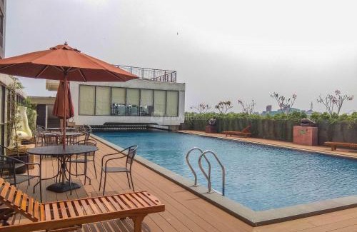 Depok Apartment | Inviting Minimalist Studio Dave Apartment for Your Stay