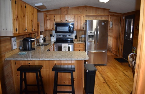 Lowesville House | Charming Log Cabin Retreat with RV/Boat Storage & Pet-Friendly
