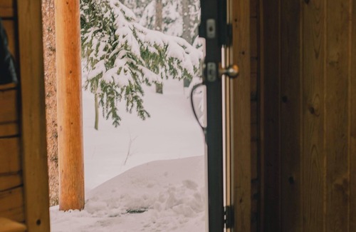 Saint Mary's Cabin | Cozy Log Cabin with Hot Tub and Private Deck Retreat