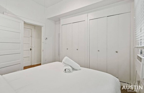 North University Apartment | Modern Mid-Century Retreat with Breakfast & Family Amenities
