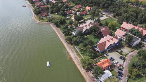 Preila Apartment | Modern Apartment with Lagoon View, Pet and Child Friendly