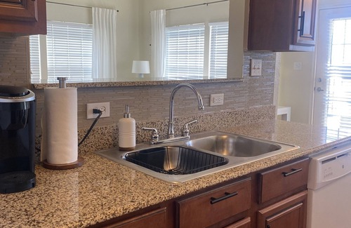 Afton House | Inviting Monkey Island Townhome with Pool & Lake Views