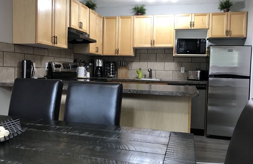East Kootenay Condo | Creekside Mountain Oasis: Family-Friendly Retreat with Pool