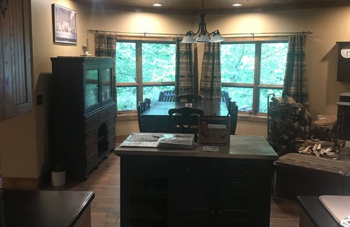 Tuckasegee Cabin | Inviting Lakefront Cabin on Wolf Lake with Hot Tub & Kayaks
