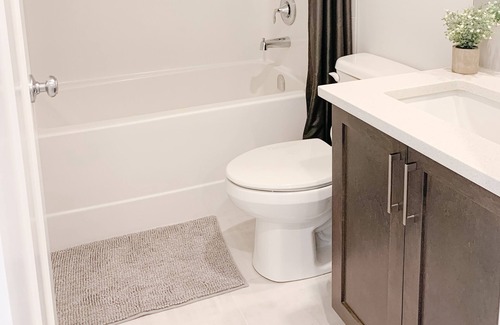 Cochrane House | Highly Rated One Bedroom Basement Suite for Families