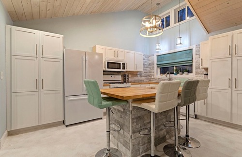 Mora House | Cozy Open Floor Plan Retreat with Hot Tub & Pet-Friendly Perks