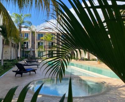 Puerto Juarez Apartment | Inviting Poolside Condo with Ocean View & Pet-Friendly Perks