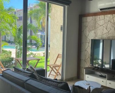 Puerto Juarez Apartment | Inviting Poolside Condo with Ocean View & Pet-Friendly Perks