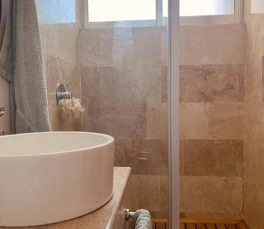 Puerto Juarez Apartment | Inviting Poolside Condo with Ocean View & Pet-Friendly Perks