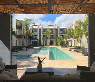 Puerto Juarez Apartment | Inviting Poolside Condo with Ocean View & Pet-Friendly Perks