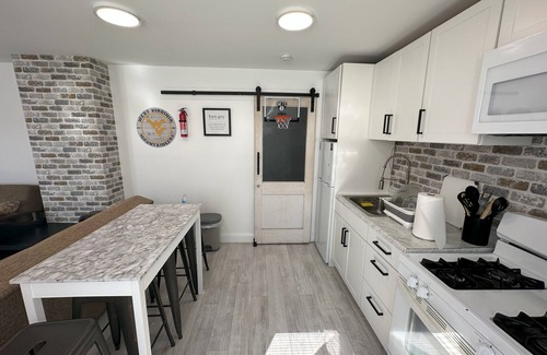 Morgantown Apartment | Inviting Apartment Steps from Milan Puskar Stadium & WVU