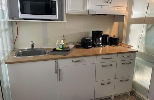 Scarborough House | Inviting Guest Suite with Kitchenette Near Local Amenities
