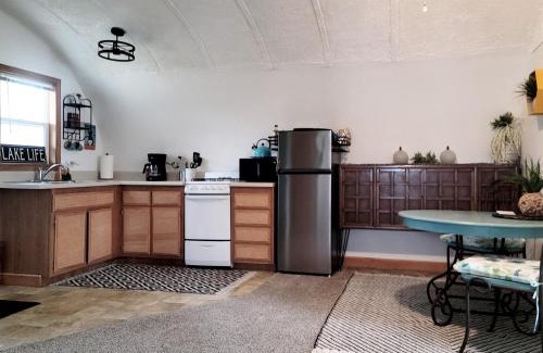 Paw Paw House | Charming Quonset Hut Retreat on Scenic Maple Lake