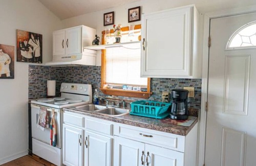 Shoreline Park House | Inviting Riverfront House with Pool & Spa for Memorable Stays