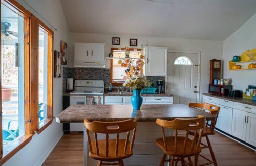 Shoreline Park House | Inviting Riverfront House with Pool & Spa for Memorable Stays
