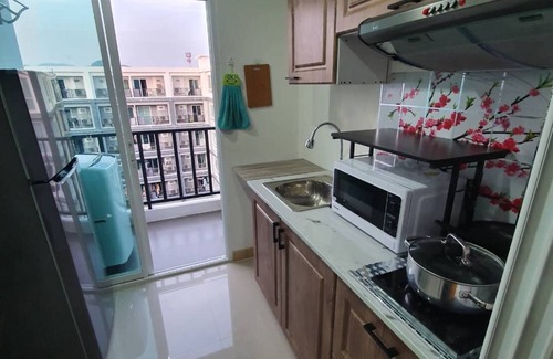Phuket Apartment | Inviting Pool View Room in Phuket for Your Getaway