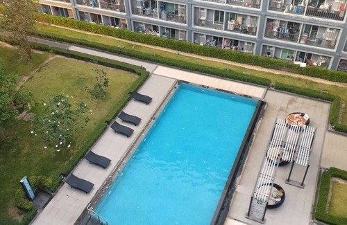 Phuket Apartment | Inviting Pool View Room in Phuket for Your Getaway