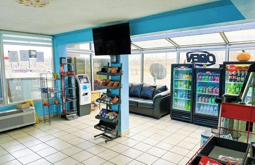 Madisonville Hotel | Cozy Room with King Bed and Microwave and Fridge for a Comfortable Stay
