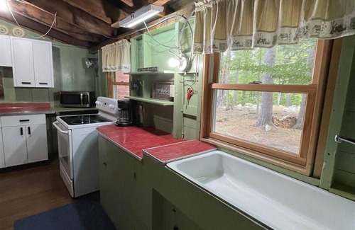 South Casco Cottage | Charming Rustic Cottage with Ocean and Lake Views