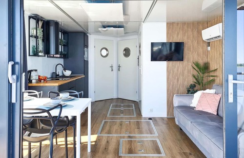 Mielno Boat Rental | Stylish Houseboat Retreat with Lake Jamno Views