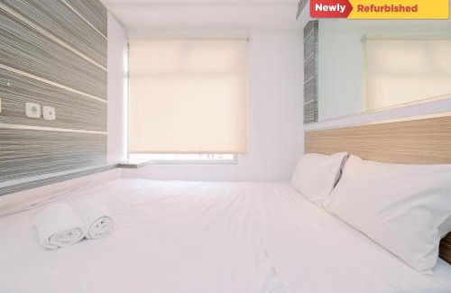 Pluit Apartment | Cozy 2BR Green Bay Pluit Apartment for Your Ideal Getaway