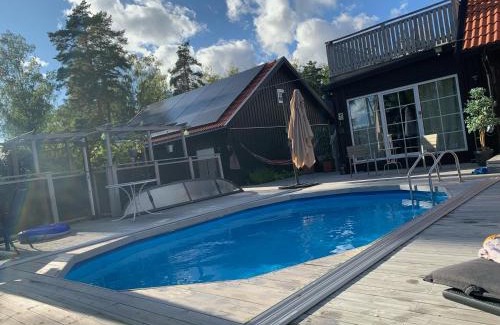Upplands-Bro Municipality House | Inviting Guest House with Pool and Ocean View Retreat
