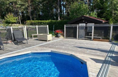Upplands-Bro Municipality House | Inviting Guest House with Pool and Ocean View Retreat