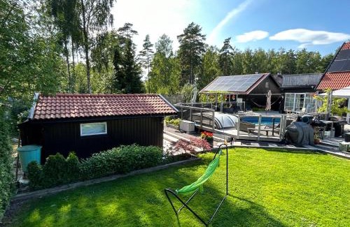 Upplands-Bro Municipality House | Inviting Guest House with Pool and Ocean View Retreat