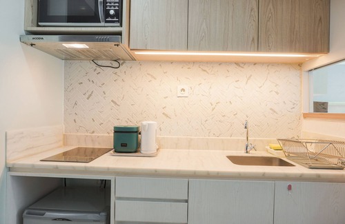 Mampang Prapatan Apartment | Inviting Studio Apartment at Nine Residence with Pool & Kitchen