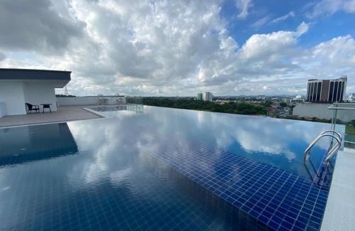 Batu Lintang Apartment | Inviting Studio at Kozi Square with Oceanfront Views