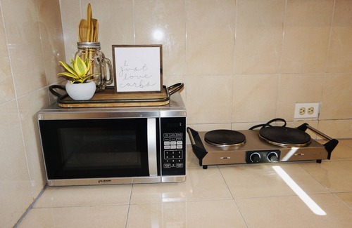 West End Apartment | Charming Oceanfront Studio with Loft in Central Negril
