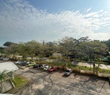 Baharu Apartment | Comfortable Suite at PD Marina Resort with Pool Access