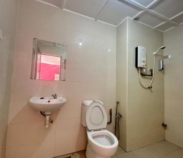 Baharu Apartment | Comfortable Suite at PD Marina Resort with Pool Access