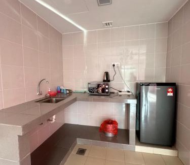 Baharu Apartment | Comfortable Suite at PD Marina Resort with Pool Access