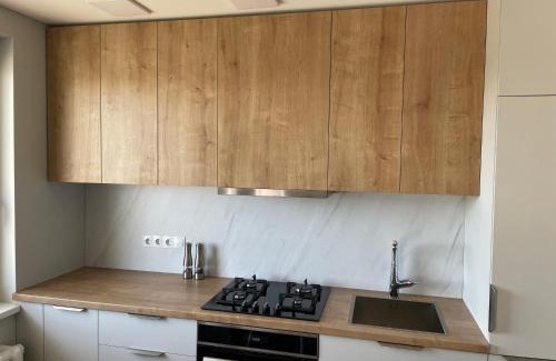 Panevezys Apartment | Inviting Urban Retreat - Family-Friendly with Top Ratings