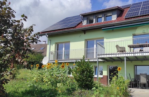 Weilheim Apartment | Cozy vacation apartment with carport and wallbox for you and your pet.