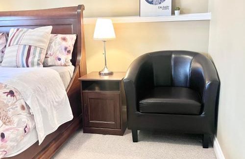 Southwest Calgary House | Renovated Walkout Suite with King Bed and Kitchen