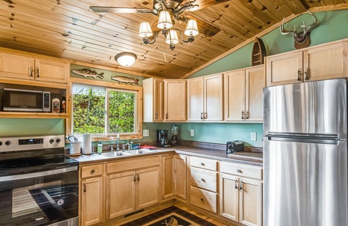 Lac du Flambeau House | Scenic Waterfront Cabin with Deck, Boat Dock & Fire Pit
