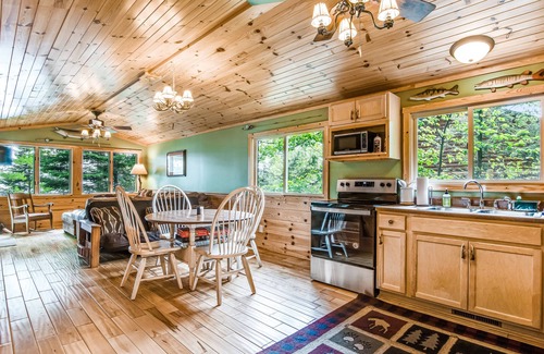 Lac du Flambeau House | Scenic Waterfront Cabin with Deck, Boat Dock & Fire Pit