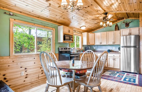 Lac du Flambeau House | Scenic Waterfront Cabin with Deck, Boat Dock & Fire Pit