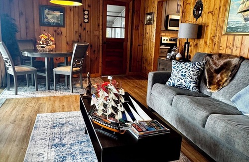 Newaygo Cottage | Inviting Lakefront Retreat with Kayaks, Docks & Sunroom