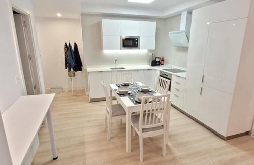 Algorta Apartment | Inviting White Home in Getxo with Accessible Amenities
