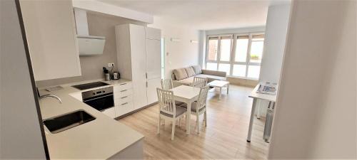 Algorta Apartment | Inviting White Home in Getxo with Accessible Amenities