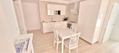 Algorta Apartment | Inviting White Home in Getxo with Accessible Amenities
