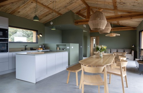 Pianotolli-Caldarello Villa | Elegant Wooden Villa with Pool & Sea View, Near Beaches
