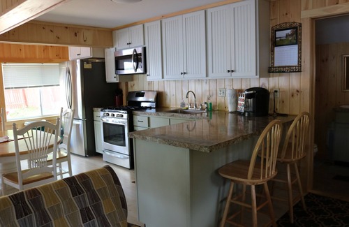 Peru Cabin | Pet-Friendly Camp with Waterfront Access & Pool - Rated 9.8