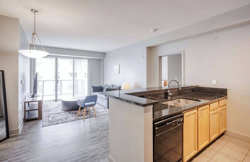 Central Business District Apartment | CozySuites at the Banks gym, pool 11