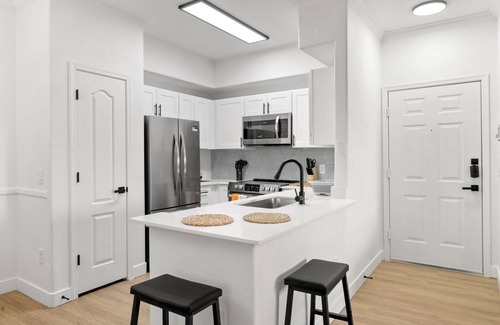 Chandler Apartment | CozySuites Chandler: Relax with Pools, Spa & Arcade Fun