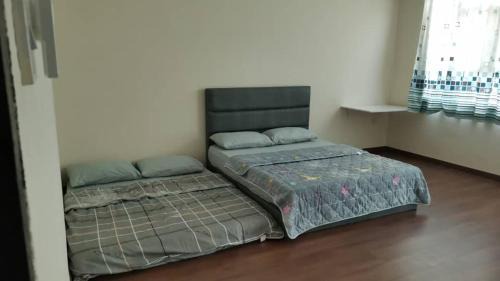 Bintulu House | Cozy Child-Friendly Retreat at Cozzy26 Homestay